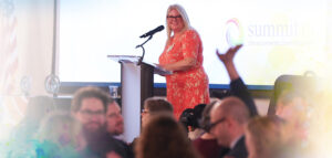 Superintendent Lisa Kamlowsky speaking to the crowd at the community breakfast.