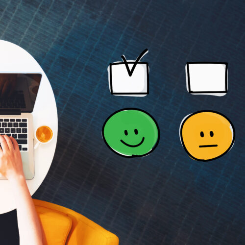 illustrated survey icons next to a person using a laptop on a white table