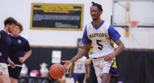 In-game action photo from the Summit DD vs Special Olympics Basketball Game.