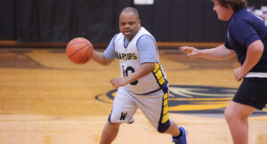 In-game action photo from the Summit DD vs Special Olympics Basketball Game.