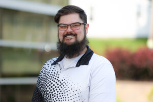 Outdoor portrait of new Summit DD team member Eric Bramer.
