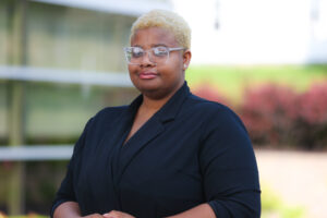 Outdoor portrait of new Summit DD team member Betty Miller.