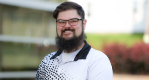 Outdoor portrait of new Summit DD team member Eric Bramer.