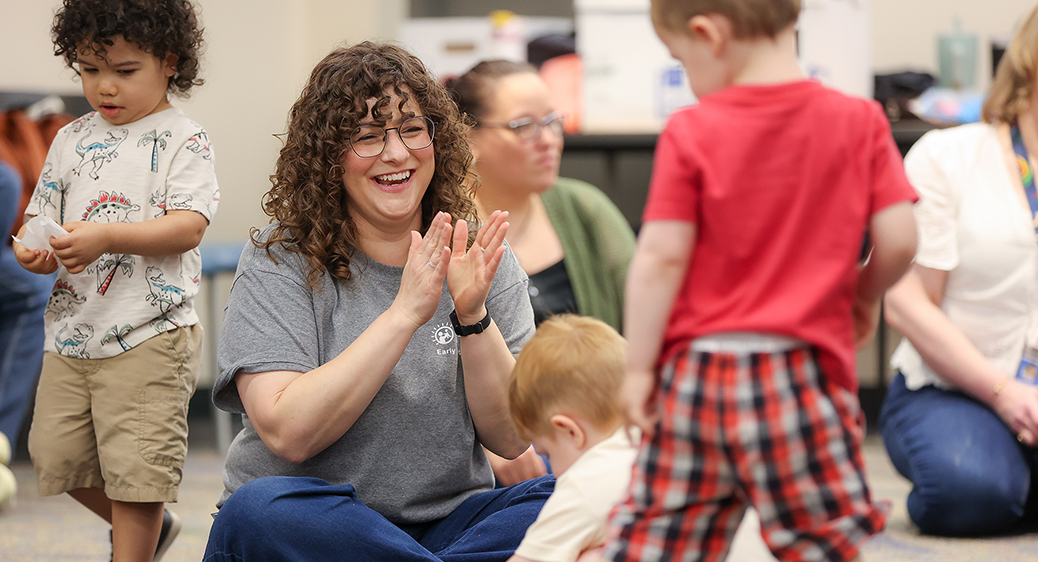 Summit DD team member playing with a child at the Speech Language Pathology Playgroup.
