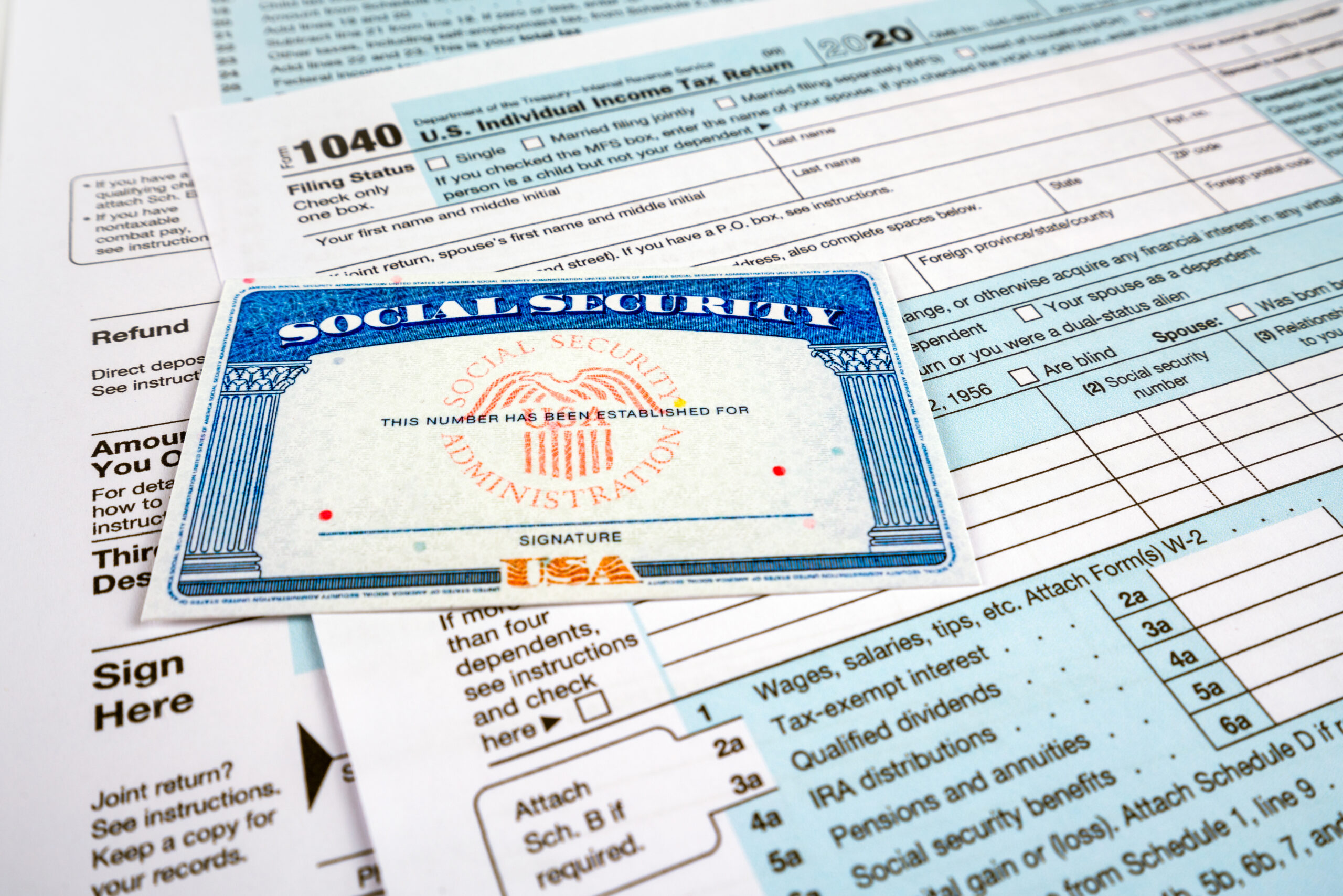 Blank social security card, and 1040 us individual tax income re