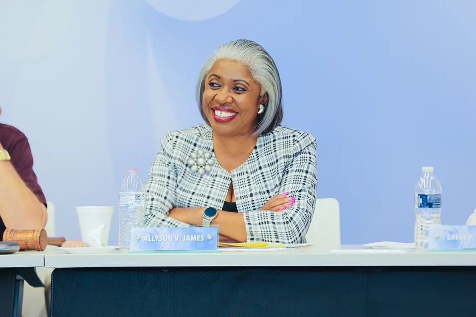 Photo of Summit DD Board Member, Allyson V. James smiling at a board meeting