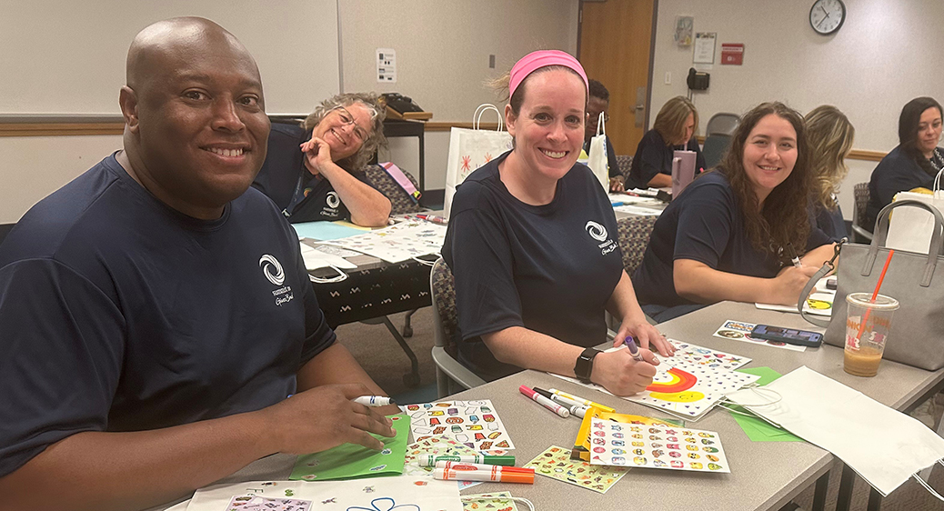 Group photo of Summit DD employees volunteering in the community.