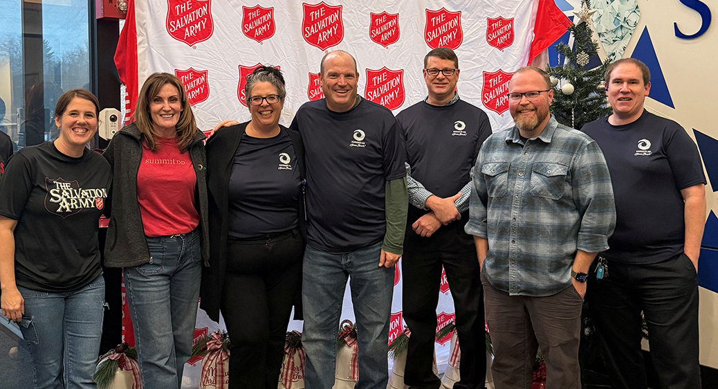 Group photo of Summit DD employees volunteering in the community.