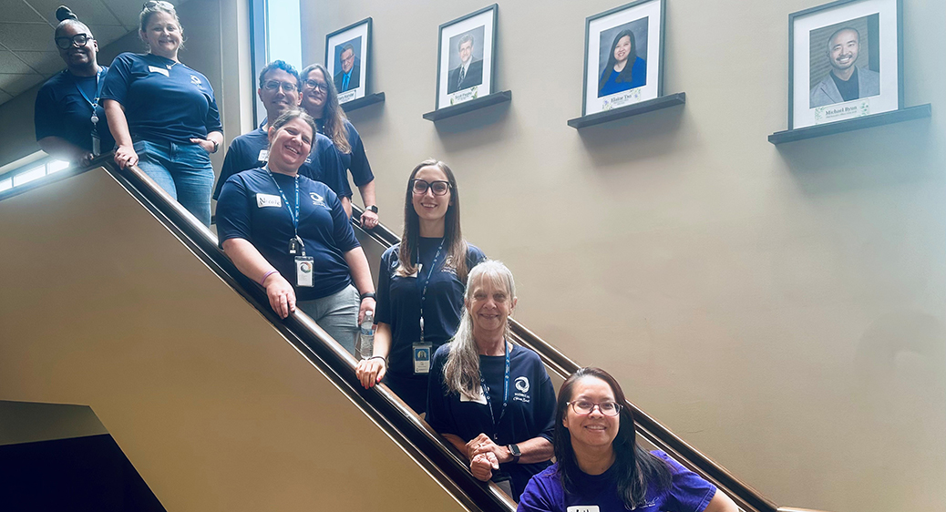 Group photo of Summit DD employees volunteering in the community.