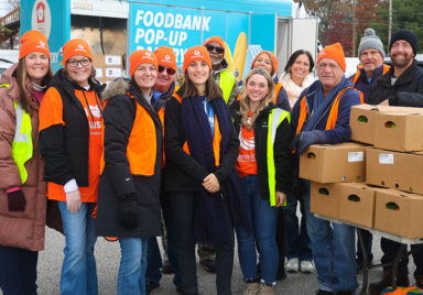 Group photo of Summit DD employees volunteering in the community.