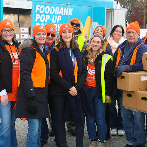 Group photo of Summit DD employees volunteering in the community.