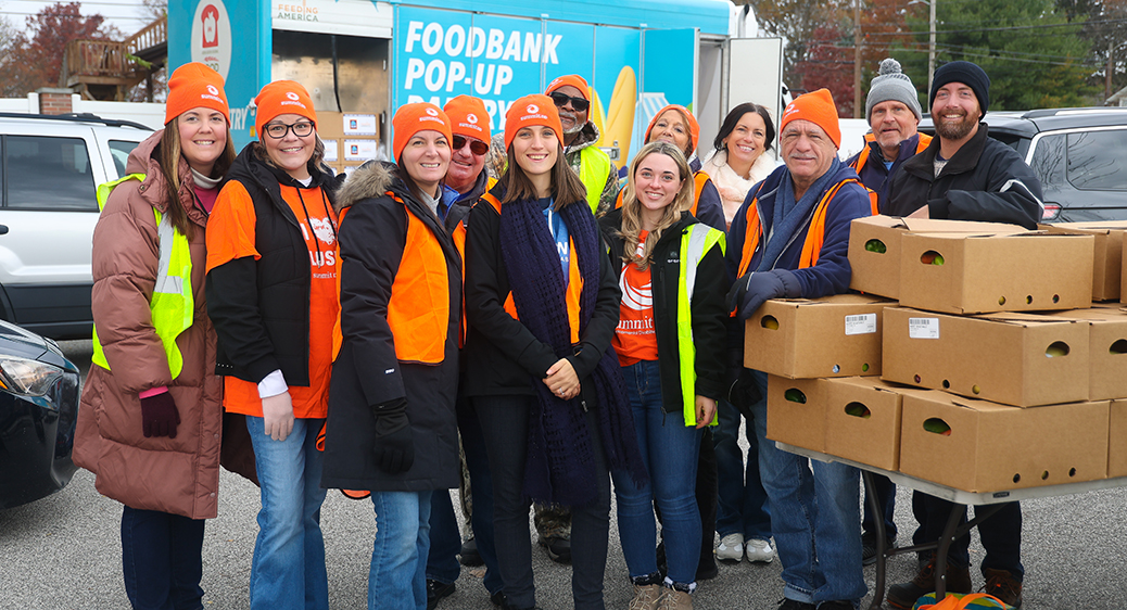 Group photo of Summit DD employees volunteering in the community.