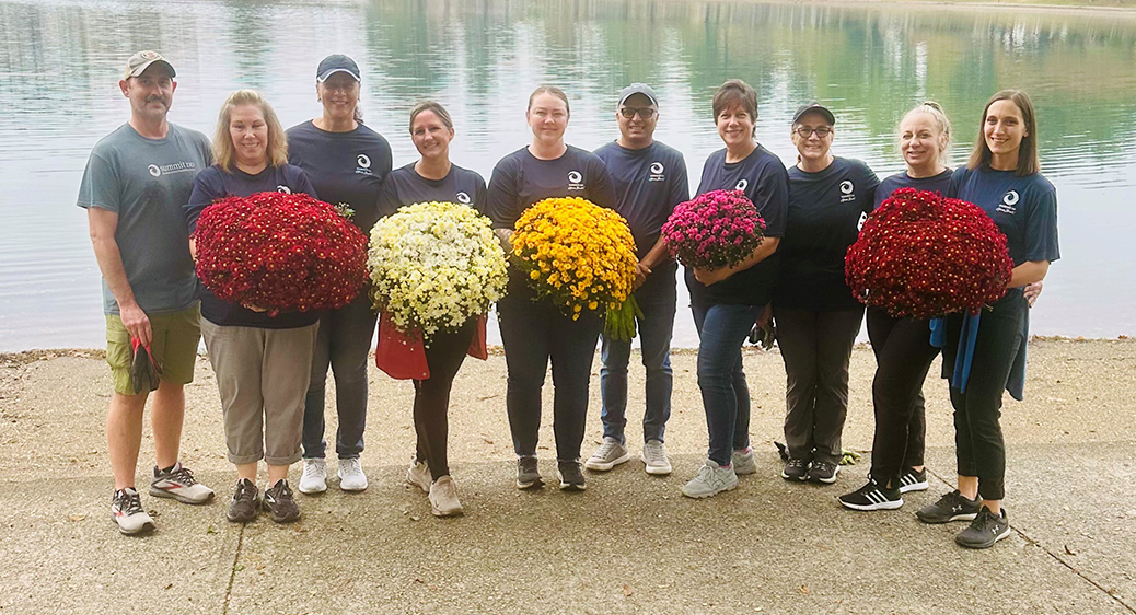 Group photo of Summit DD employees volunteering in the community.