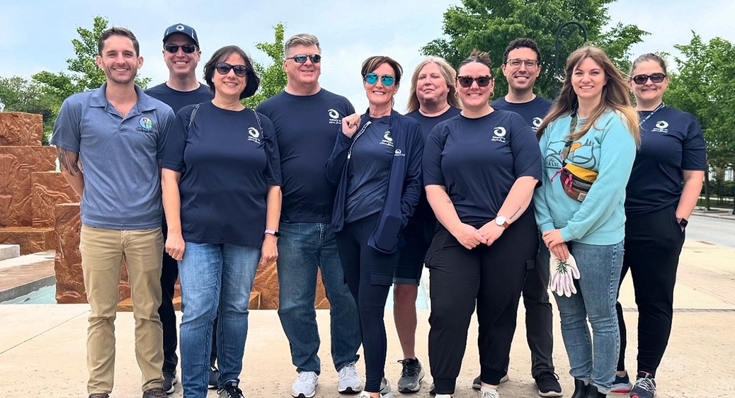 Group photo of Summit DD employees volunteering in the community.
