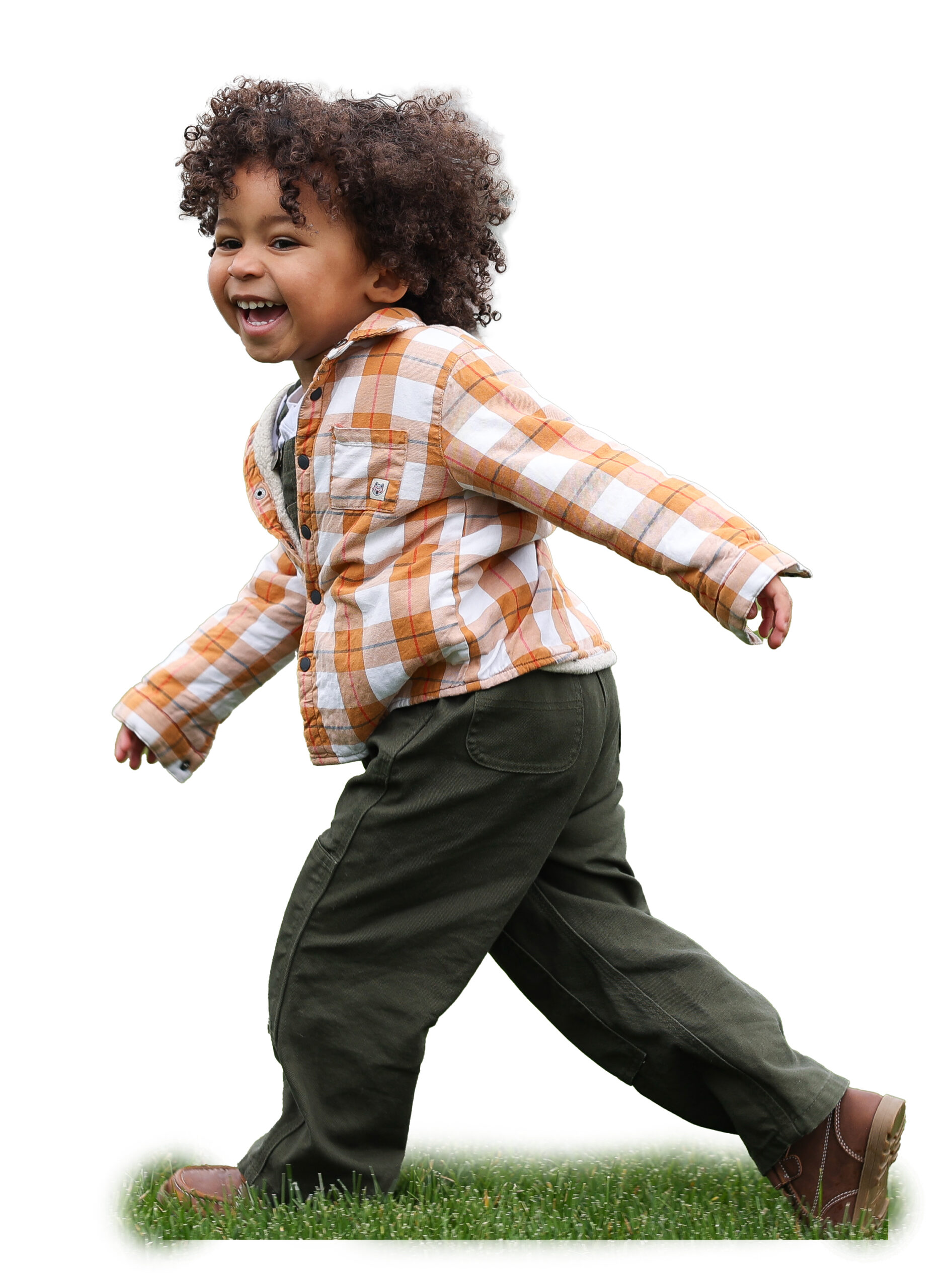 Outline of a toddler boy laughing and running in the grass