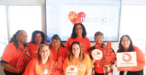 Summit DD staff members holding Inclusion messages