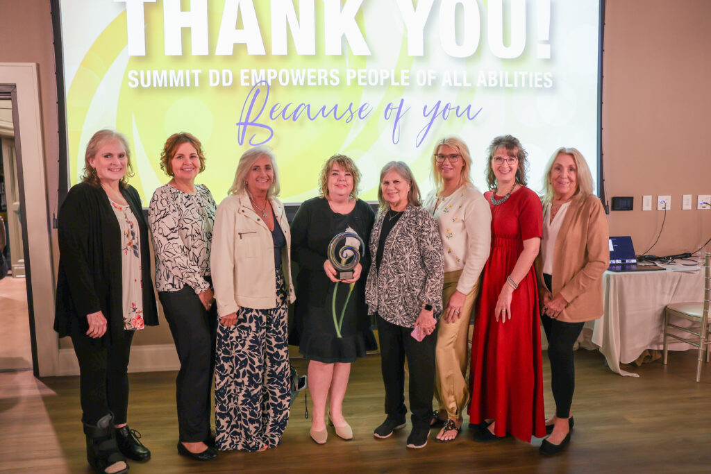Russ Pry Award Winners, Wednesdays Child posing with award