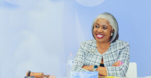 Summit DD Board member Allyson V. James smiling at board meeting