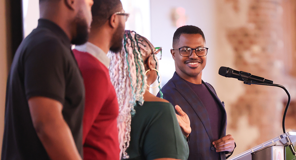 Large group of smiling attendees at the Summit DD Appreciation Breakfast.