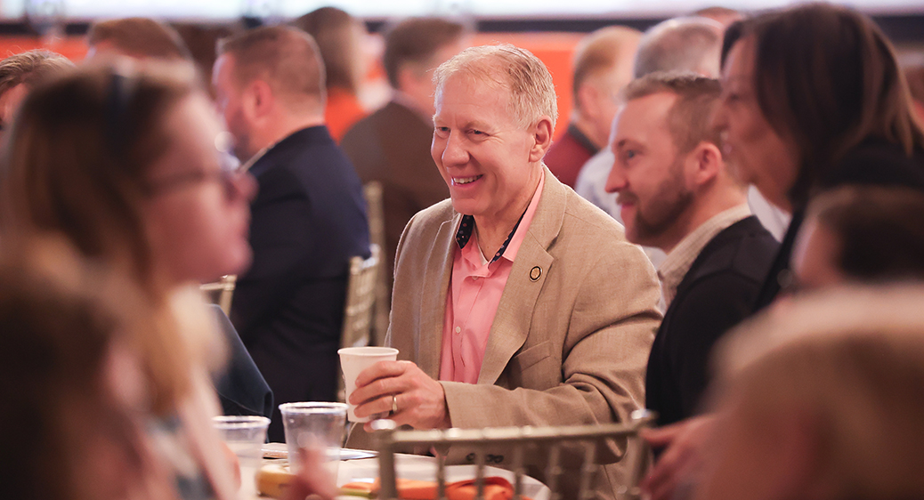 Large group of smiling attendees at the Summit DD Appreciation Breakfast.