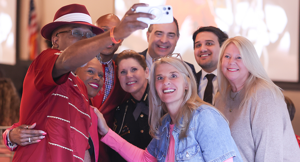 Large group of smiling attendees at the Summit DD Appreciation Breakfast.