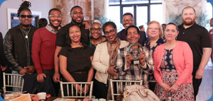 Smiling group photo of direct support professionals who won an award at Summit DD's Community Breakfast.