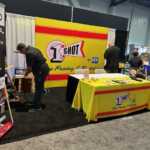 Trade show booth exhibit at SEMA 2025 for Matthews Paint 1 Shot PPG