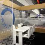 Trade show booth exhibit at SEMA 2025 for Orafol and KPMF