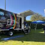 Trade show booth exhibit at SEMA 2025 for PPG