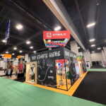 Custom trade show booth exhibit with urban vibe modern graphics for PPAI for Stahls