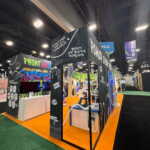 Custom trade show booth exhibit with urban vibe modern graphics for PPAI for Stahls