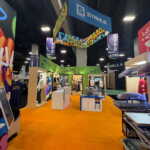 Custom trade show booth exhibit with urban vibe modern graphics for PPAI for Stahls
