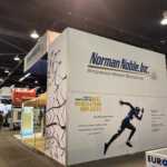 Custom island exhibit trade show booth for Norman Noble at MD&M West 2026