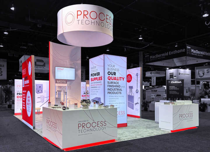custom island exhibit with vector lighted tower and LED lighted graphics for Process Technology at SUR/FIN 2025