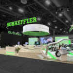 Custom exhibit booth with LED video towers, raised platforms and product kiosks for Schaeffler at CES 2025