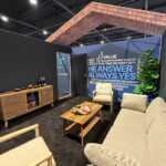 Custom island double deck exhibit for Green Corp American Plastics at Inspired Home 2026