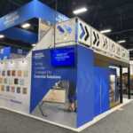 Custom double-deck island exhibit for Master Builders