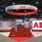 Custom exhibit island trade show booth for ABB at IEEE 2026