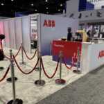 Custom exhibit island trade show booth for ABB at IEEE 2026