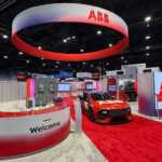 Custom exhibit island trade show booth for ABB at IEEE 2026