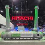 Custom exhibit island trade show booth for Hitachi at IEEE 2026