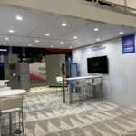 Custom island double deck rental exhibit for JST at IEEE 2026