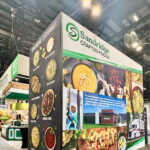 Custom island booth for Sandridge at IDDBA 2026