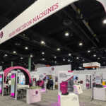 Custom split island booth for Fives Pietro at IMTS 2026