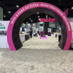 Custom split island booth for Fives Pietro at IMTS 2026