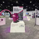 Custom split island booth for Fives Pietro at IMTS 2026
