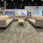 Custom split island booth for Fives Pietro at IMTS 2026