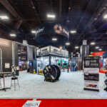 Custom double deck two story multi level exhibit for Southwire at NECA 2026