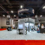 Custom double deck two story multi level exhibit for Southwire at NECA 2026