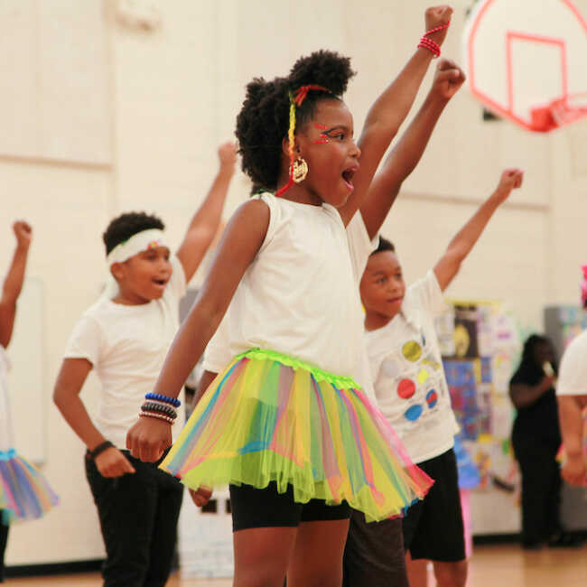Students dancing in gymnasium